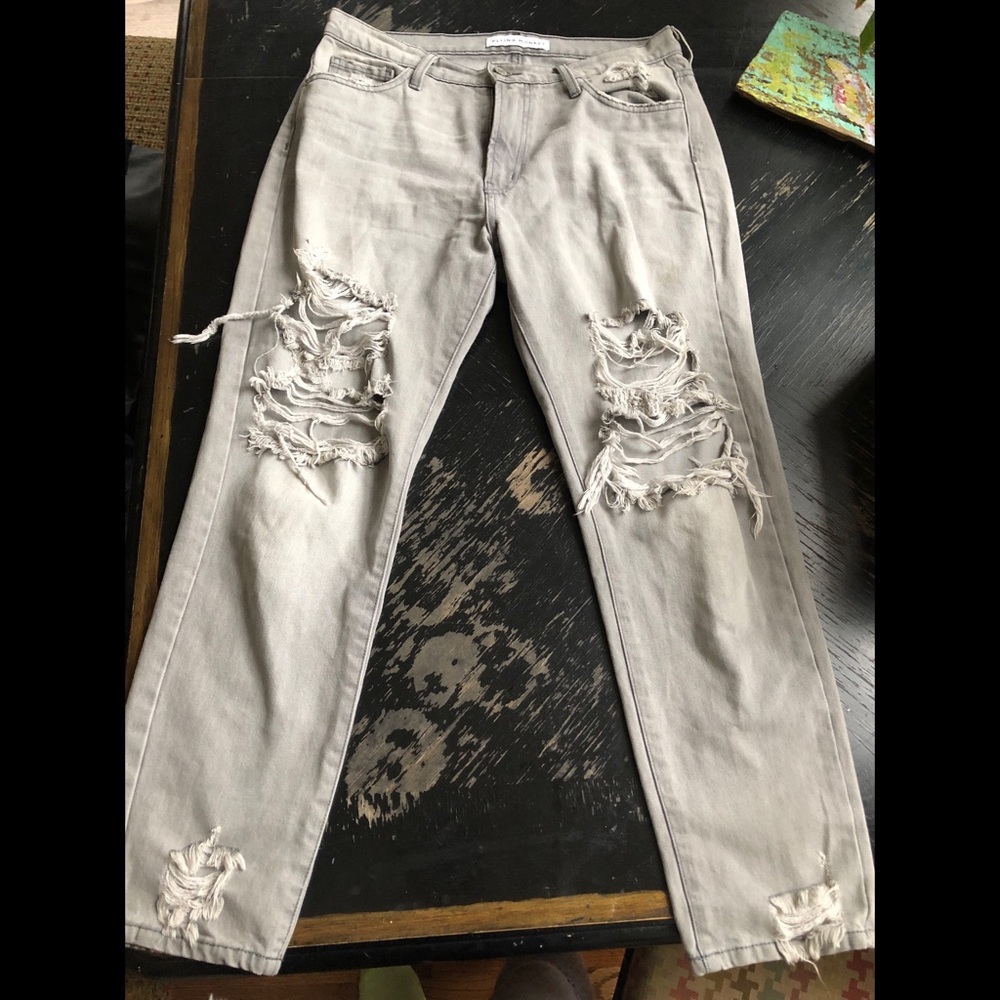Gray wash ripped jeans